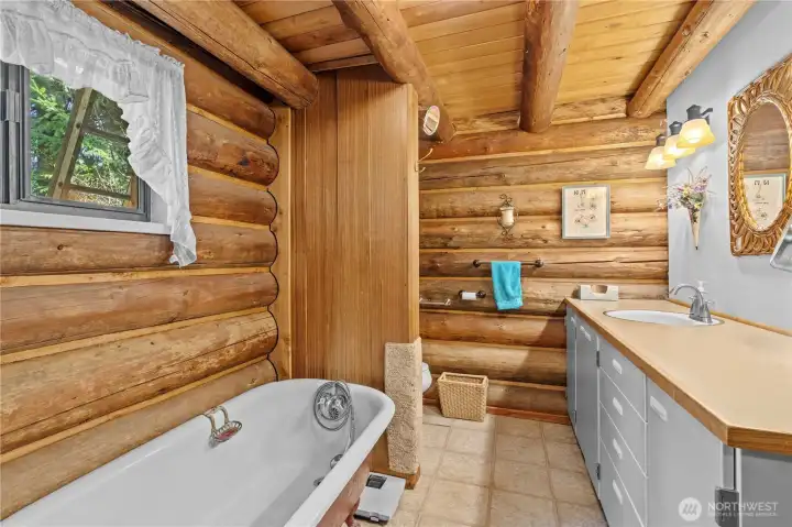 AMAZING Claw Foot Bath Tub in this spacious Bathroom. Plenty of counter space for all your needs. Shower is to the left, just before the tub.
