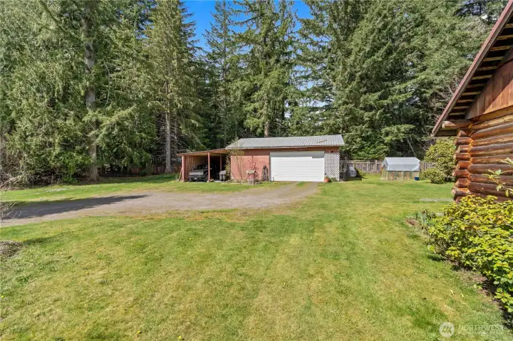 Shop/Garage is ready to hold all your toys and yard equipment!