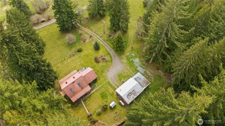 Home, Garage, Shop, Covered Storage, Garden Space, Pastures. You've got it all here!