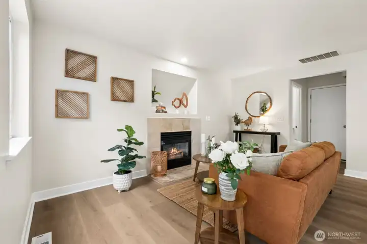 The gas fireplace creates a welcoming focal point in the family room. Whether hosting friends or enjoying a quiet night in, this space feels instantly inviting.