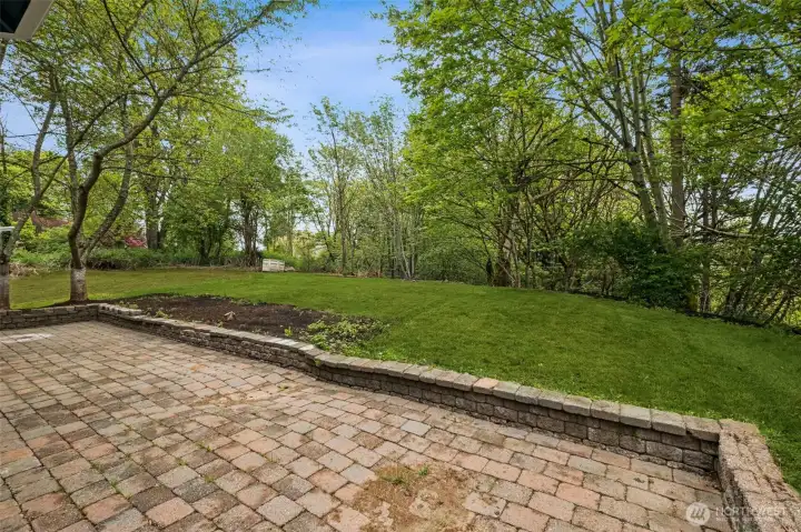 The large back patio provides room to host Summer Bar-B-Ques and gatherings.  The open lawn area offers plenty of room for outdoor activities, from summer gatherings to quiet relaxation. It’s a blank canvas for your outdoor vision.