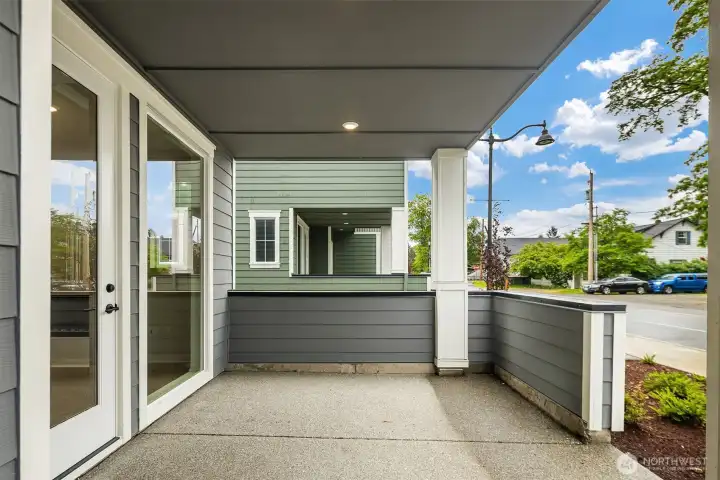 Covered front porch. Similar home shown.