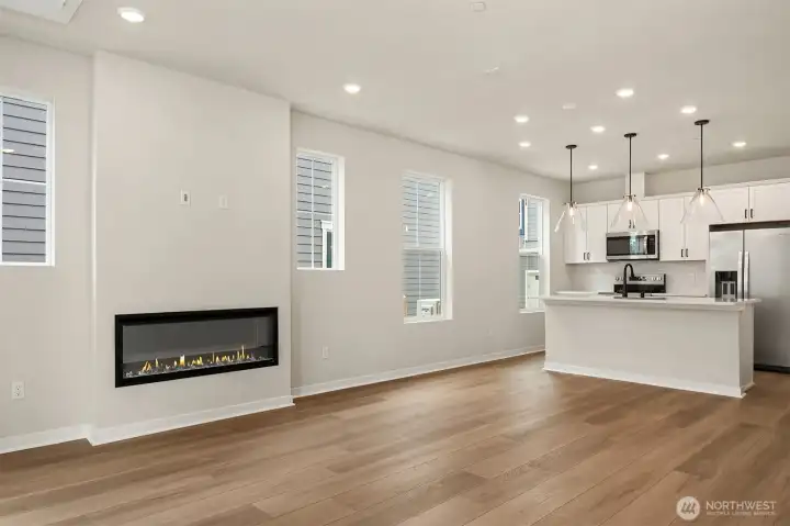 Gathering room with electric, customizable fireplace