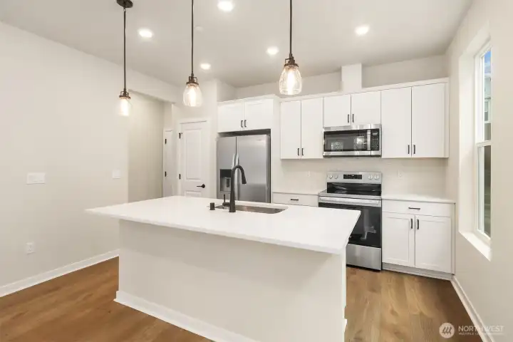Kitchen. Similar home shown.