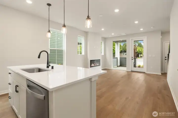 Garage hall towards gathering room. Similar home shown.