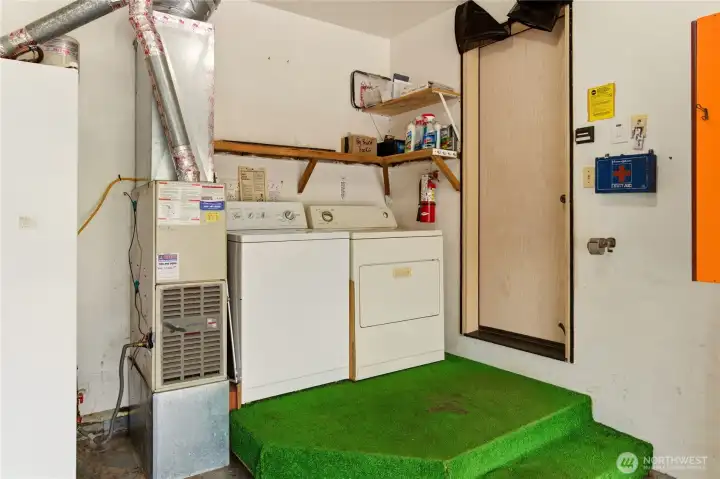 The washer and dryer and the Natural Gas hot water heater are in the garage The washer and dryer and the Natural Gas hot water heater are in the garage