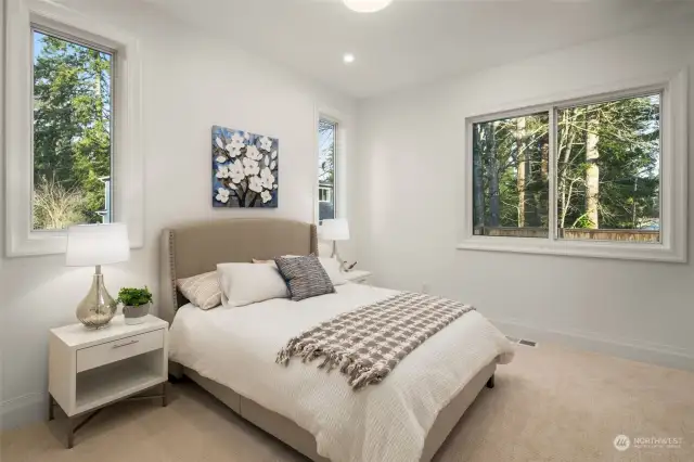 Main floor bedroom with en-suite bath