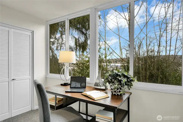Enclosed deck space with extra storage. Perfect at home office.