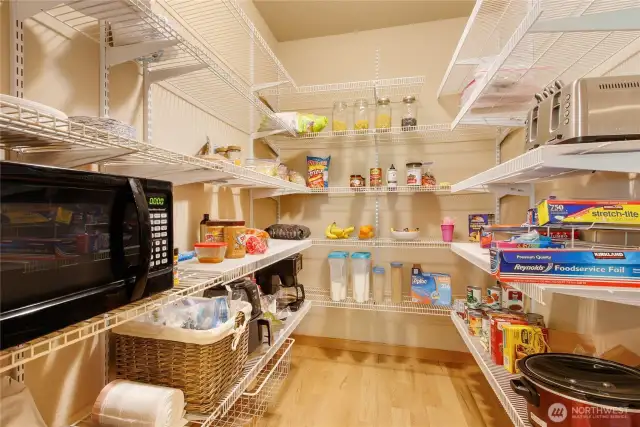 Huge walk in pantry with plenty of shelving!