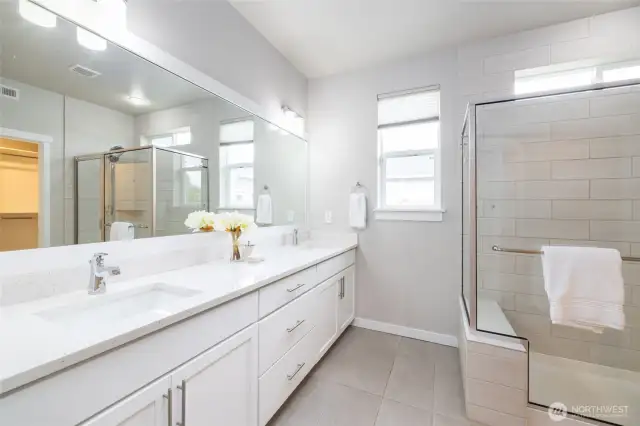 Primary ensuite bath with dual sink vanity