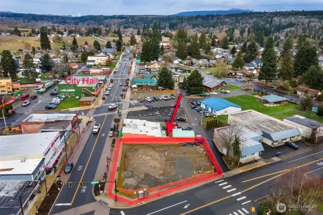 Prime corner lot on Tolt Ave/Hwy 203 and Entwistle St.; two high visibility, pedestrian and vehicle traffic flow streets