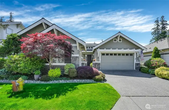 Just a five minute, level stroll to the clubhouse is this beautifully upgraded Hemlock plan home. This one has the 2 car garage plus the 3rd garage bay.