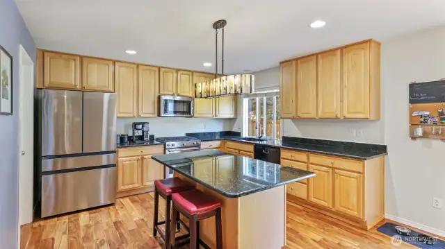 Gourmet kitchen featuring a spacious island-perfect for meal prep, casual dining, and entertaining space