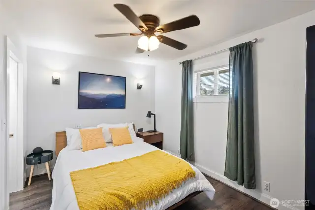 Primary bedroom with walk-in closet & partial view of Mt. Rainier from window!