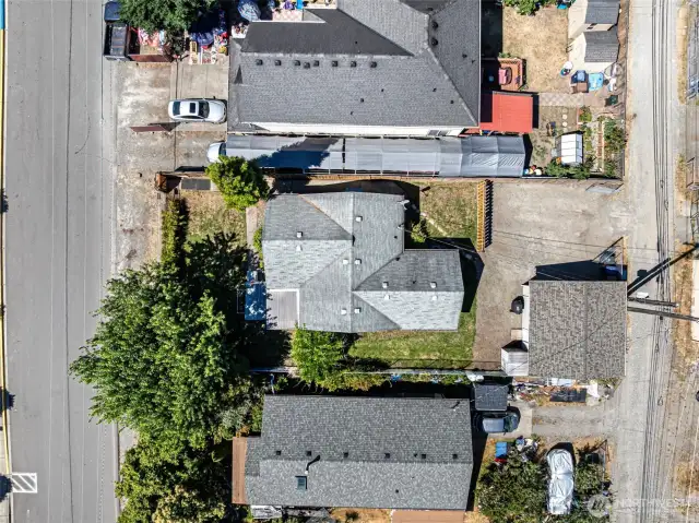An oasis in the city with your fully-fenced .138 acre property!
