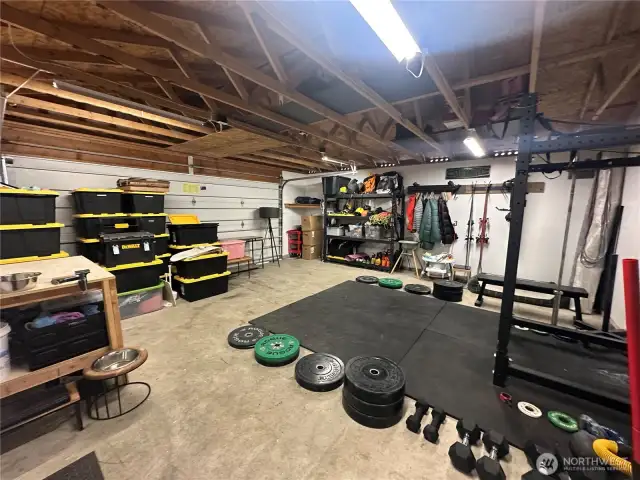 Lots of space inside the 2-car garage for vehicles, storage and even your own gym!