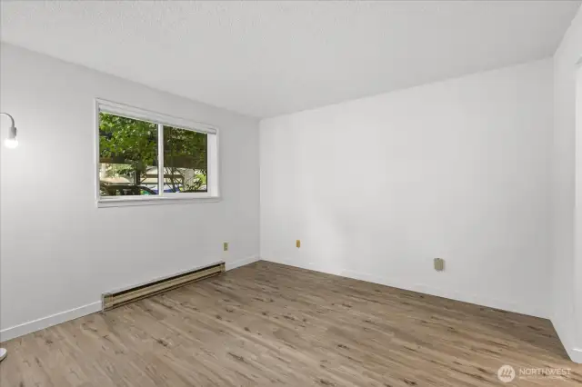 Primary bedroom with area to primary closet and bath to the right.