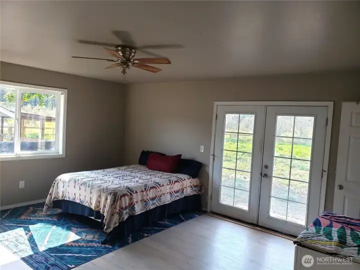 French doors, vinyl plank flooring.