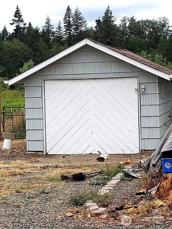One car garage used for tool shed