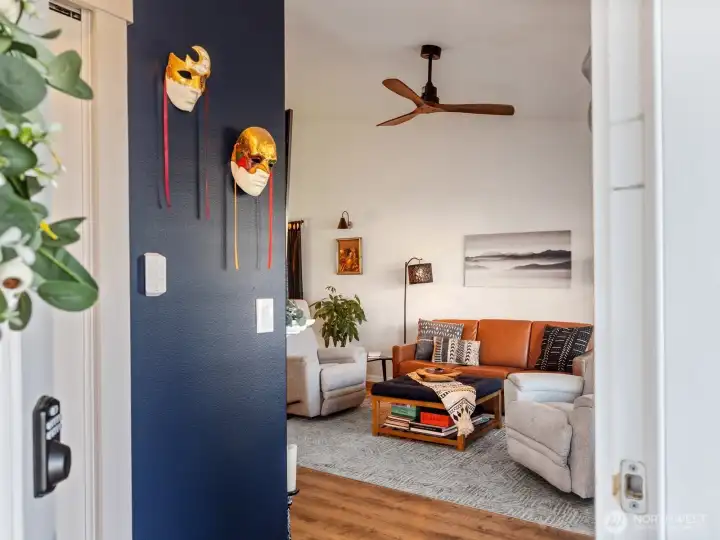 Tall ceilings and open concept greet you upon entry