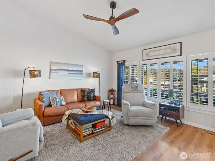 Plantation shutters throughout this home give it such a cozy vibe