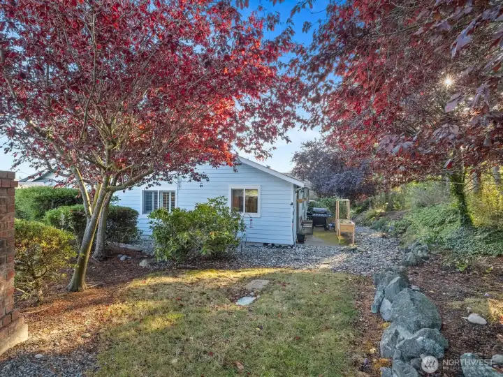 Corner lot offers a decent amount of outdoor space, and all yard work is covered by the HOA