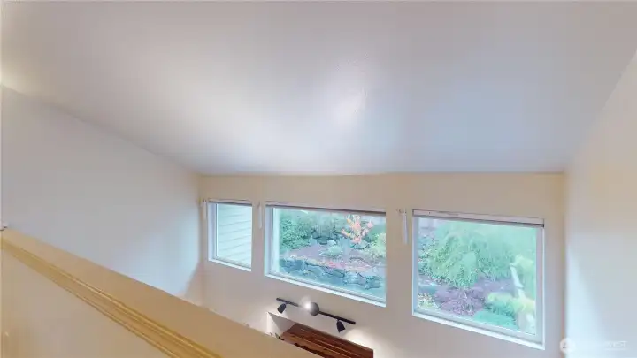 Looking from the loft area at the transom windows in the Livingroom area