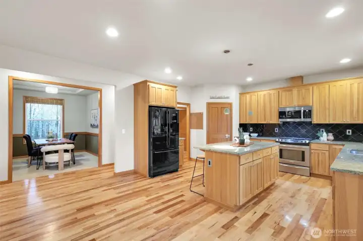 Easy flow from kitchen to dining room for effortless meals.