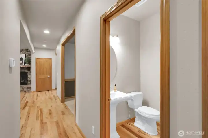 Half bath located downstairs for guests.
