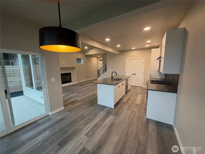Eating area looking back to kitchen/living with slider on left to backyard