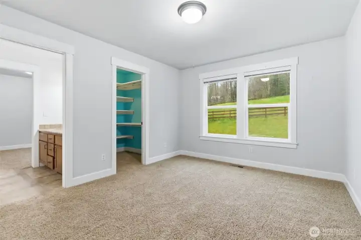 Upstairs bedroom #2, featuring walking in closet and bathroom