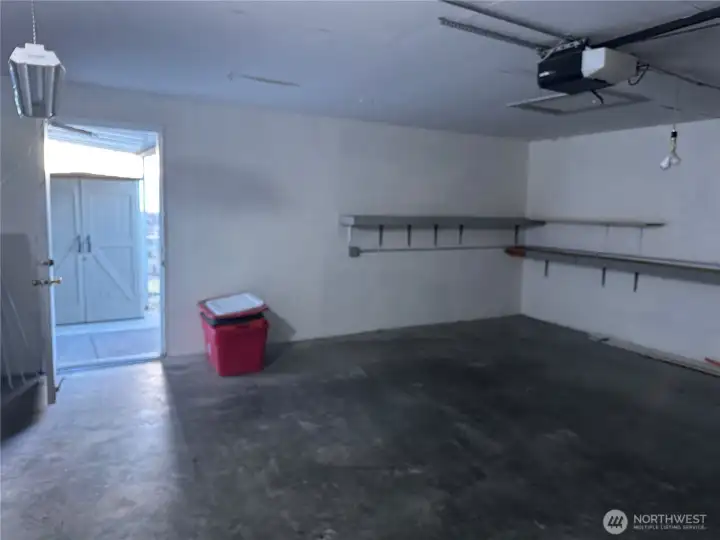 Large garage with shelving
