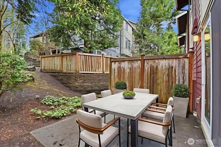 Main floor private Walk-out Patio. (Virtually Staged)