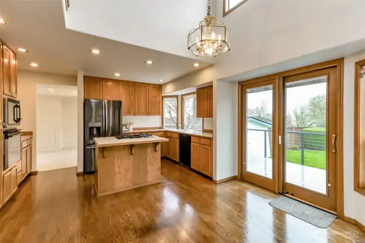 Kitchen is centrally located off the dining room, informal eating area and outdoor deck