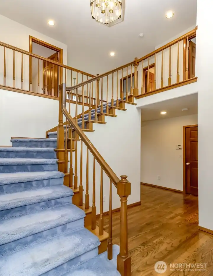 Grand entry way leads to 4 bedrooms and utility room