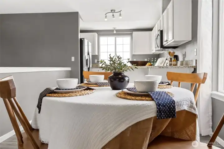 Dining area is conveniently located by the kitchen and living room