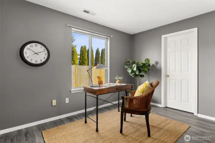 Fourth bedroom downstairs is staged as an office and has a large walk-in closet
