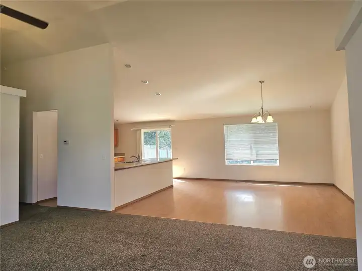 Dining and living area open to eat in kitchen