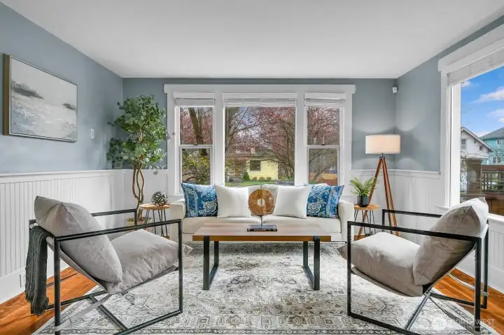 Large windows frame the gorgeous trees outside and allow plenty of light to pour in!