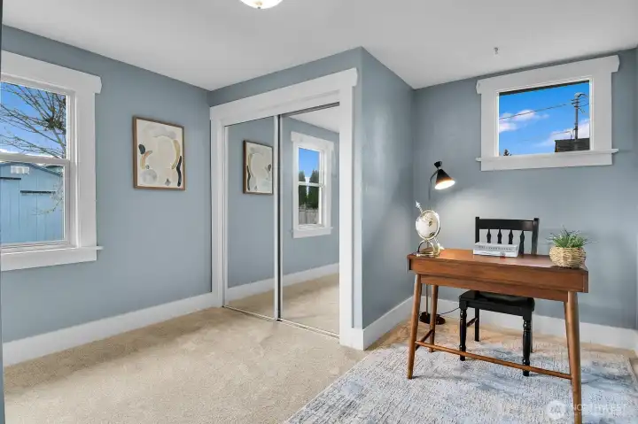 Versatile main-level office or bedroom featuring brand-new carpet for added comfort and style.