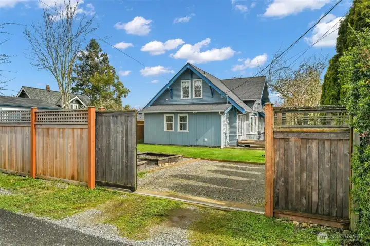 Gate off the alley for secure parking.