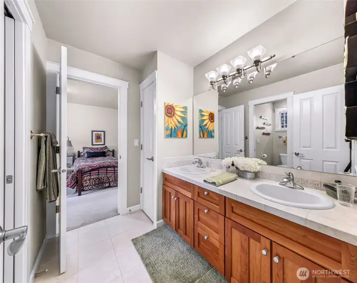 Adjoining bathroom shared between bedrooms 3 & 4