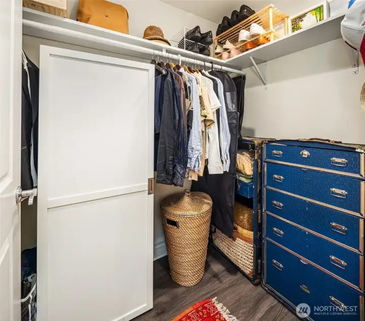 Primary suite offers abundant storage with both a walk-in closet and secondary closet.