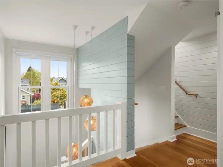 Open landing, stairs to third level.