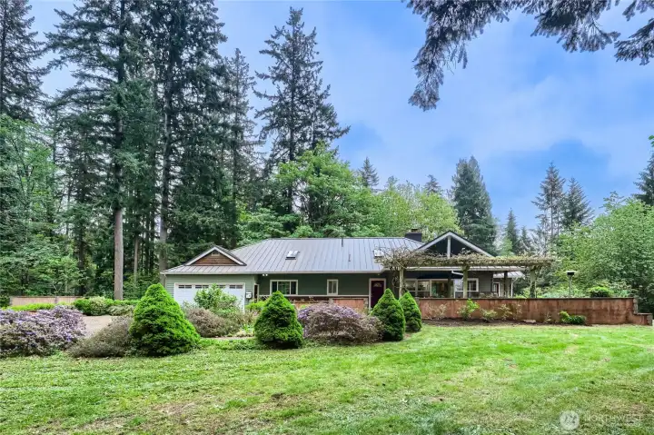 The home of your dreams! New metal roof, solar, AC, private well, 2 ADU's and SO much more!