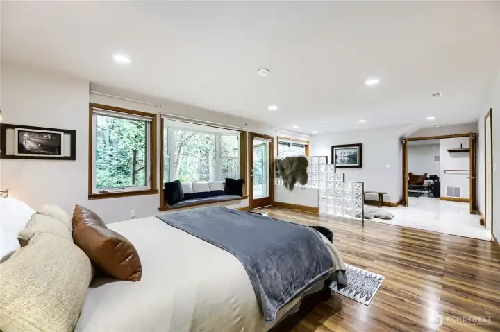 (4th bedroom) 2nd primary bedroom with views of the lush backyard