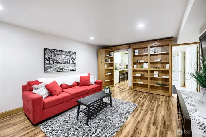 Don't miss the kitchenette, etc hidden behind the bookshelf!