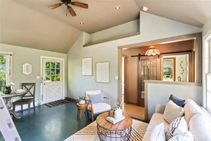 Restored hardwood floor and custom lighting