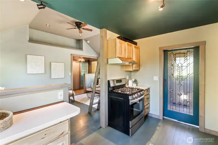 Stain glass barn door to the mud room - matching door to the bathroom too!