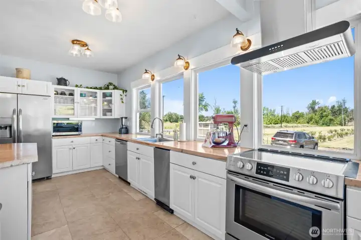 Modern conveniences and historic charm come together in the kitchen, creating a space that is both functional and welcoming.
